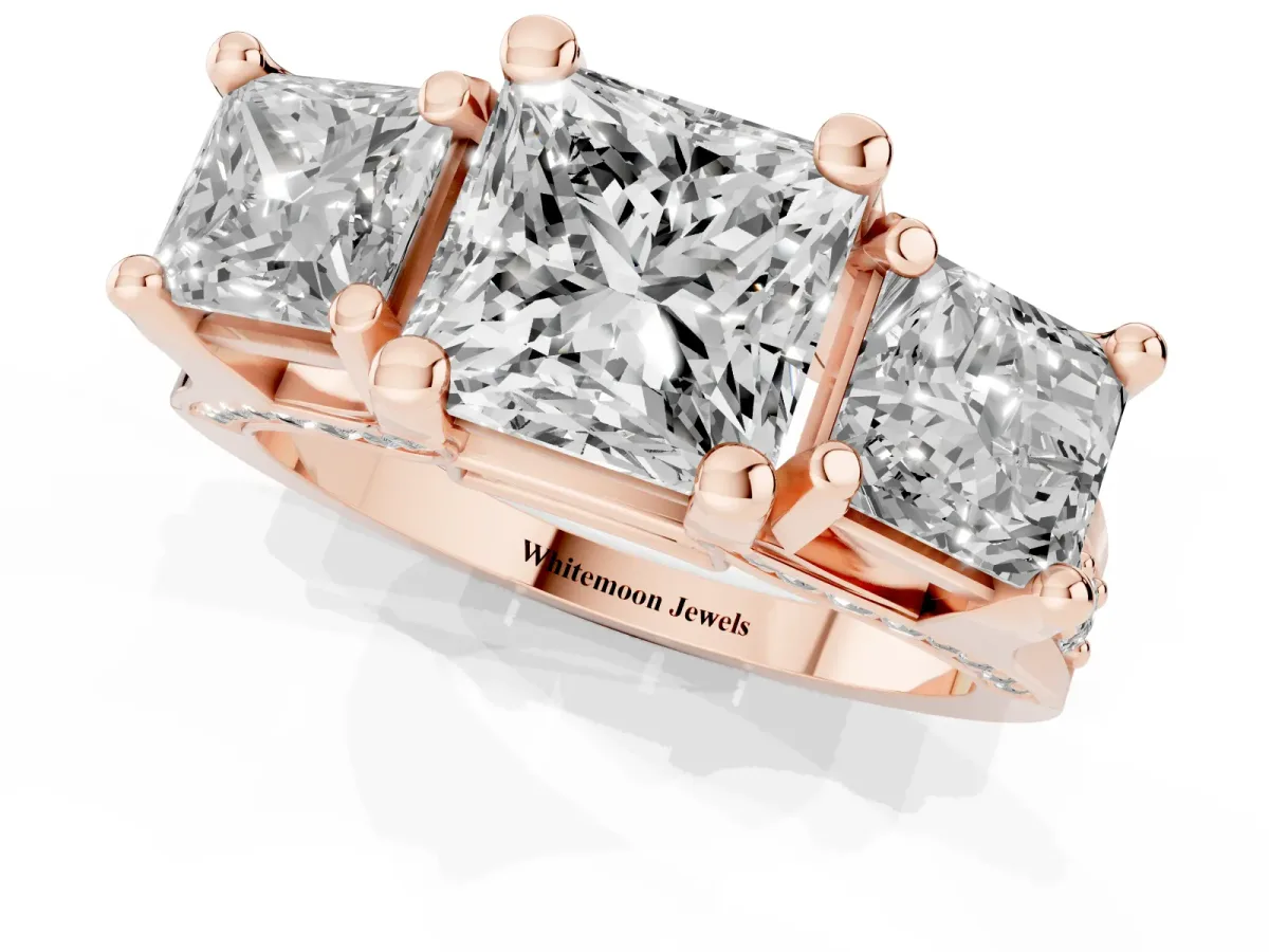Princess Cut Diamond Three-Stone Ring with Channel Set Band and Four-Prong Setting Rose gold