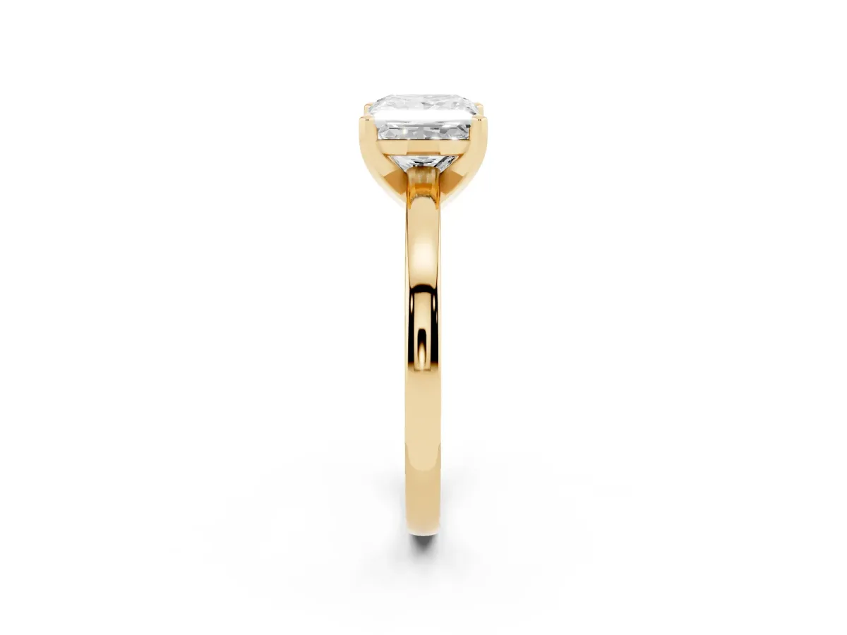 Princess Cut Solitaire Diamond Engagement Ring with Four-Prong Setting on a Classic Band Yellow gold