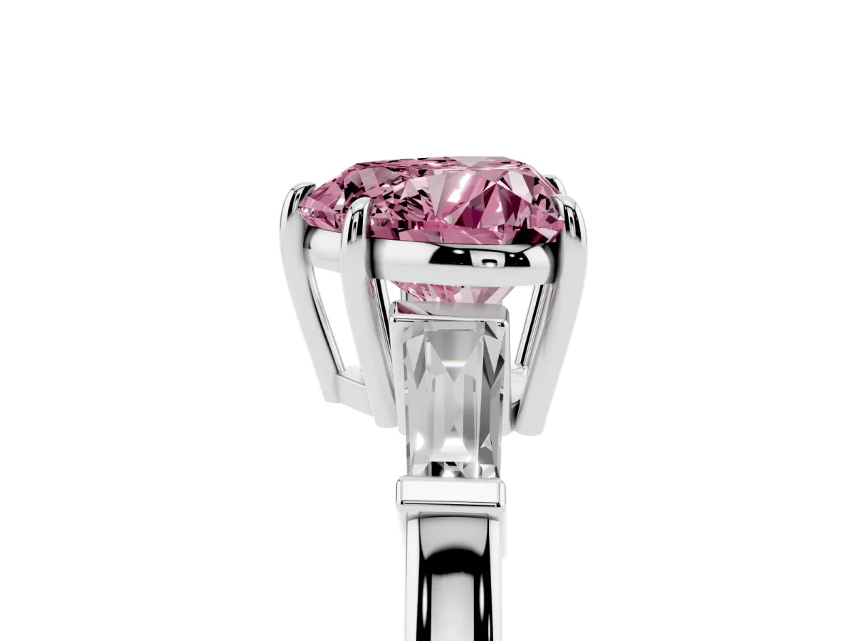 Fancy Pink Heart Cut Diamond Three-Stone Ring with Tapered Baguette Side Stones and Prong Setting Platinum