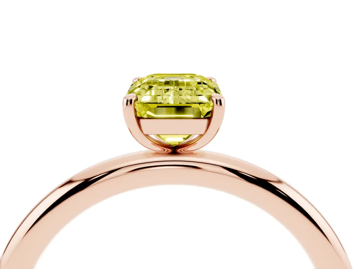 Fancy Yellow Emerald Cut Solitaire Diamond Ring with Four-Prong Setting on a Plain Band Rose gold