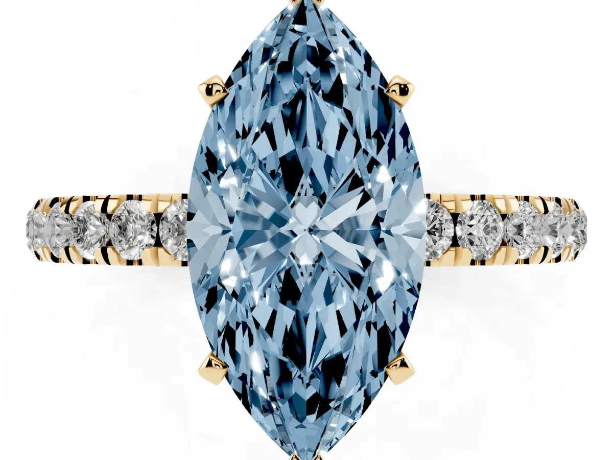 Fancy Blue Marquise Cut Diamond Solitaire Ring with Pavé Accents and Four-Prong Setting Yellow gold