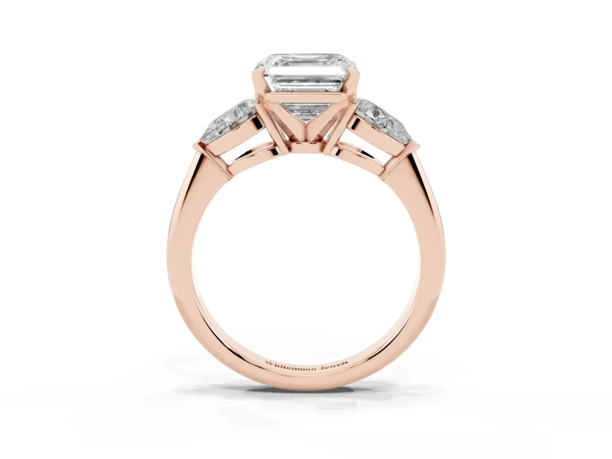 Three-Stone Asscher Cut Diamond Ring with Pear Side Stones and Four-Prong Setting Rose gold