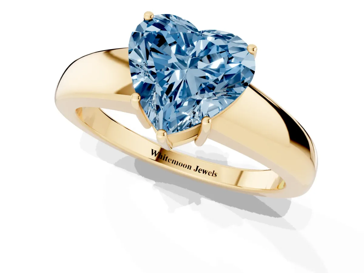 Fancy Blue Heart Cut Solitaire Diamond Ring with Tapered Band and Four-Prong Setting Yellow gold
