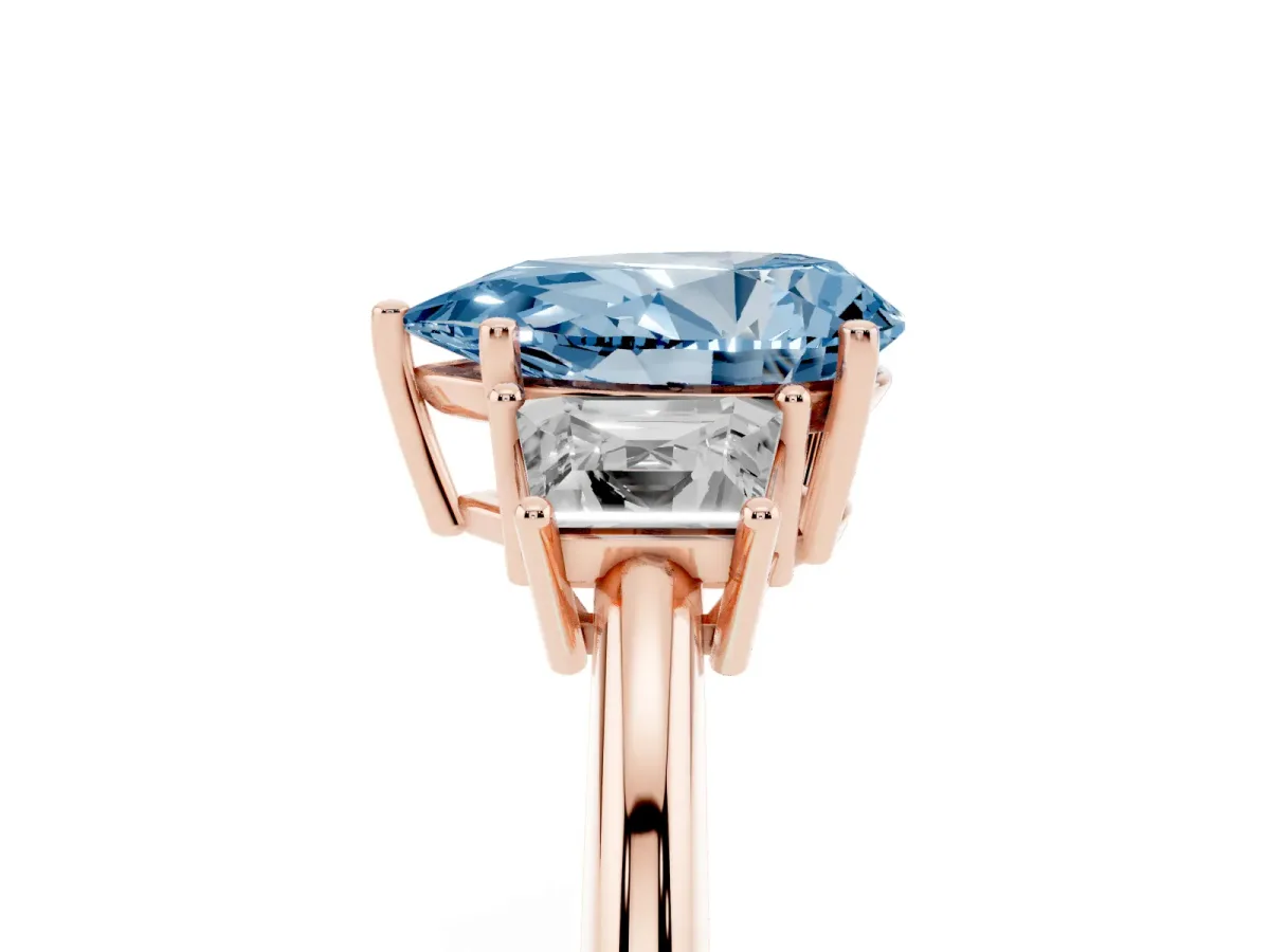 Fancy Blue Pear Cut Diamond Three-Stone Ring with Trapezoid Side Stones and Prong Setting Rose gold