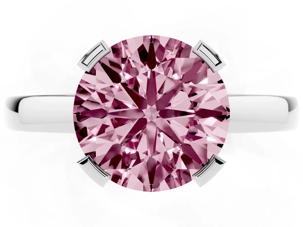 Fancy Pink Round Cut Cut Solitaire Ring with Four-Prong Setting and Classic Band Silver
