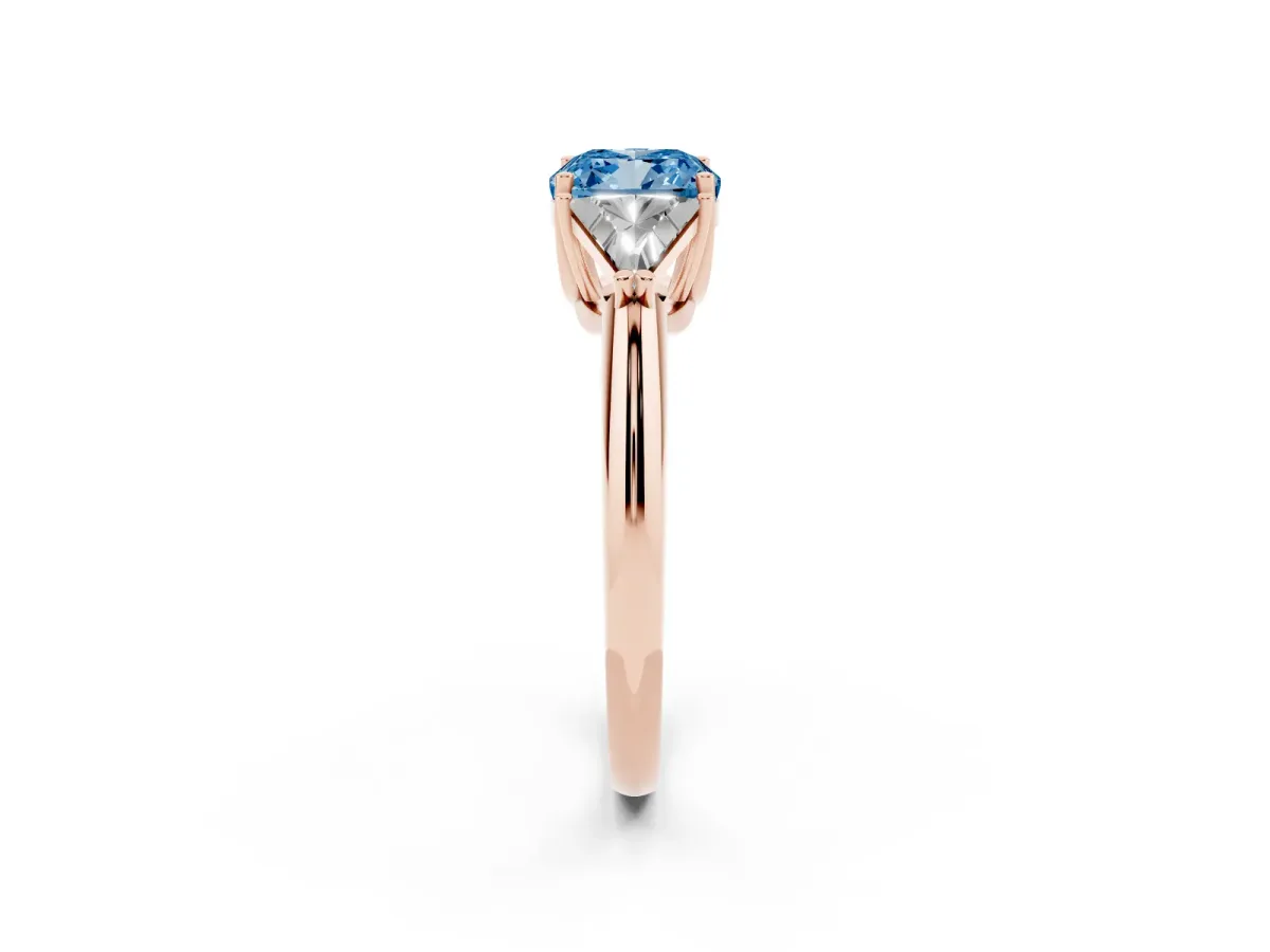 Fancy Blue Three-Stone Cushion Cut Diamond Engagement Ring with Trillion Side Stones and Prong Setting Rose gold