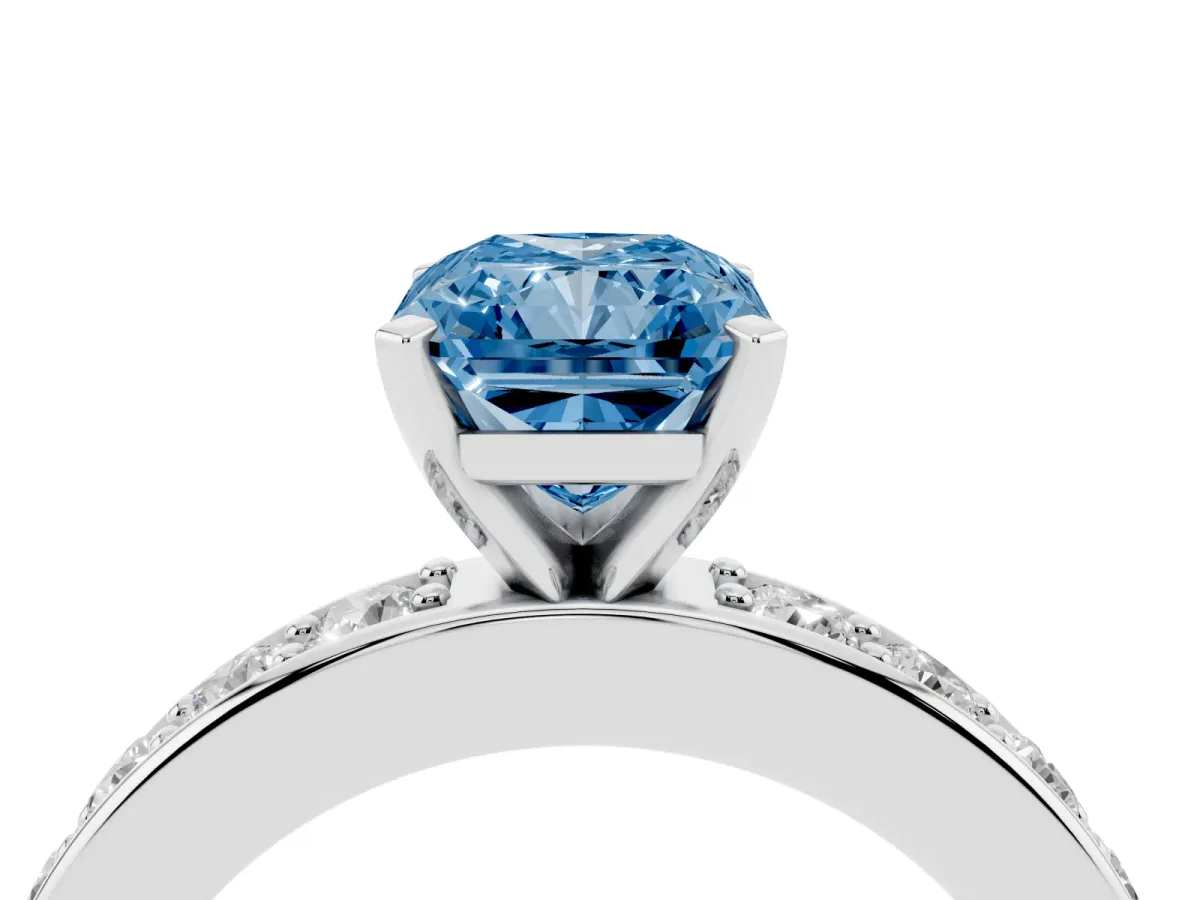Fancy Blue Radiant Cut Diamond Engagement Ring with Channel Set Round Band and Prong Setting Silver