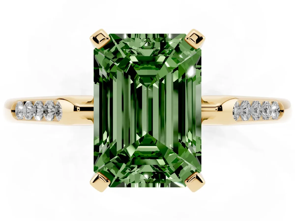 Fancy Green Emerald Cut Diamond Solitaire Ring with Channel Set Round Band and Prong Setting Yellow gold
