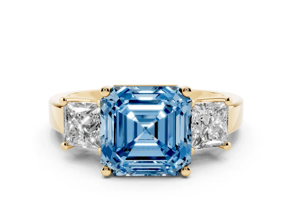 Fancy Blue Three-Stone Asscher Cut Cut Solitaire Ring with Prong Setting Yellow gold