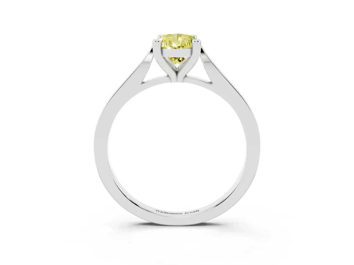 Fancy Yellow Pear Cut Solitaire Diamond Ring with Four-Prong Setting and Tapered Band White gold
