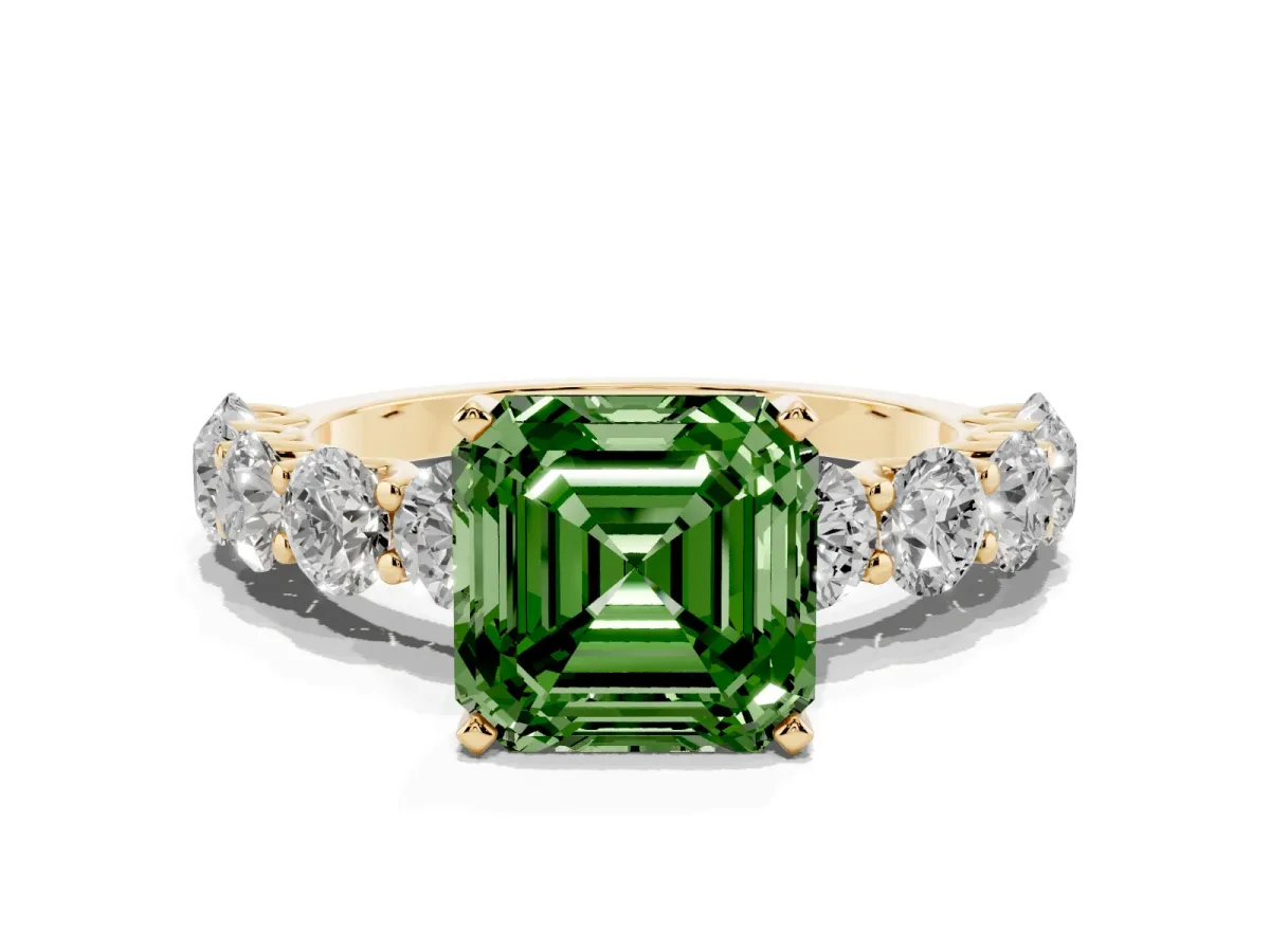 Fancy Green Asscher Cut Diamond Prong Setting with Side Stones on a Pave Band Yellow gold