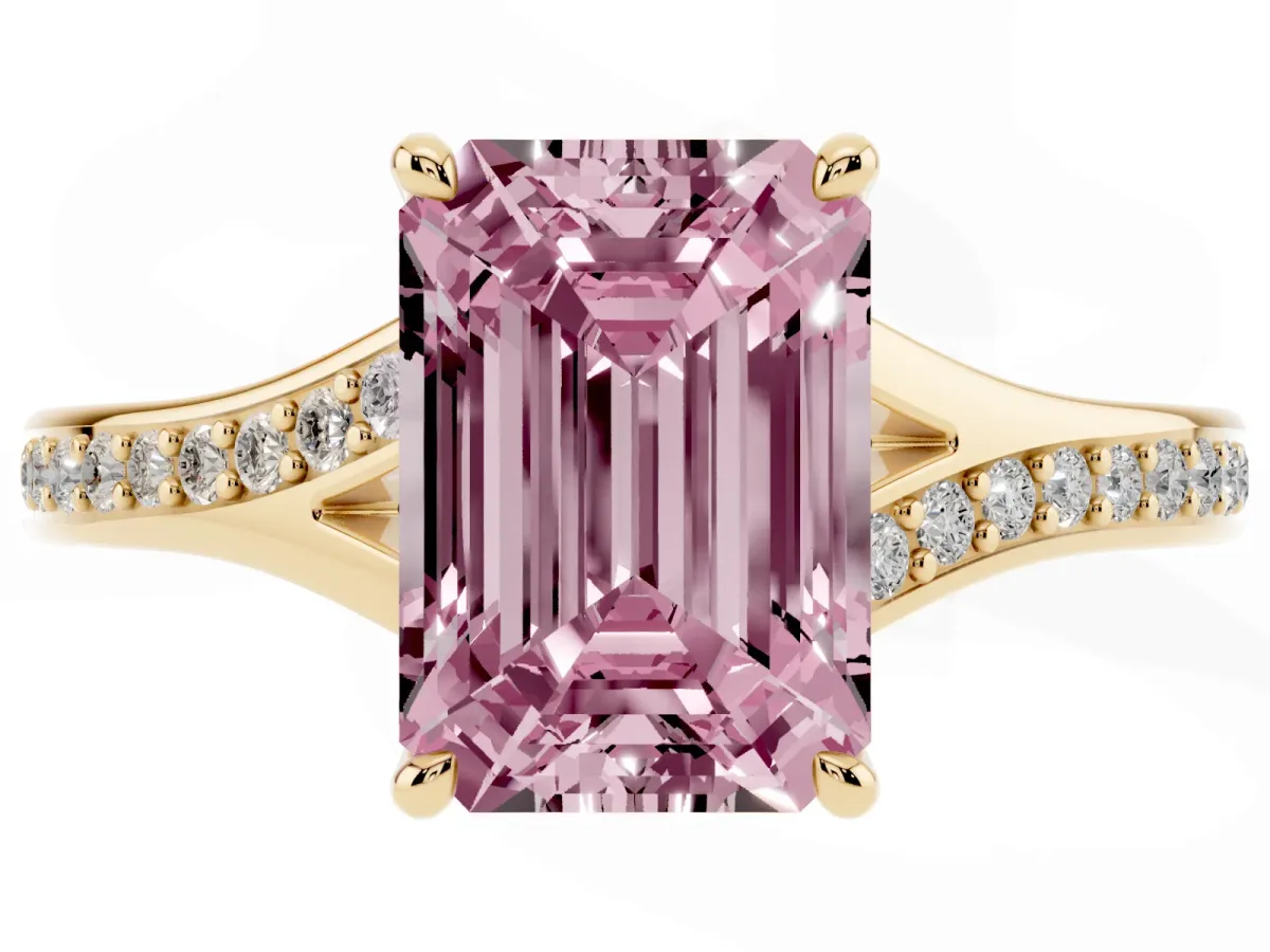 Fancy Pink Emerald Cut Diamond Solitaire Ring with Pavé Band and Prong Setting Yellow gold