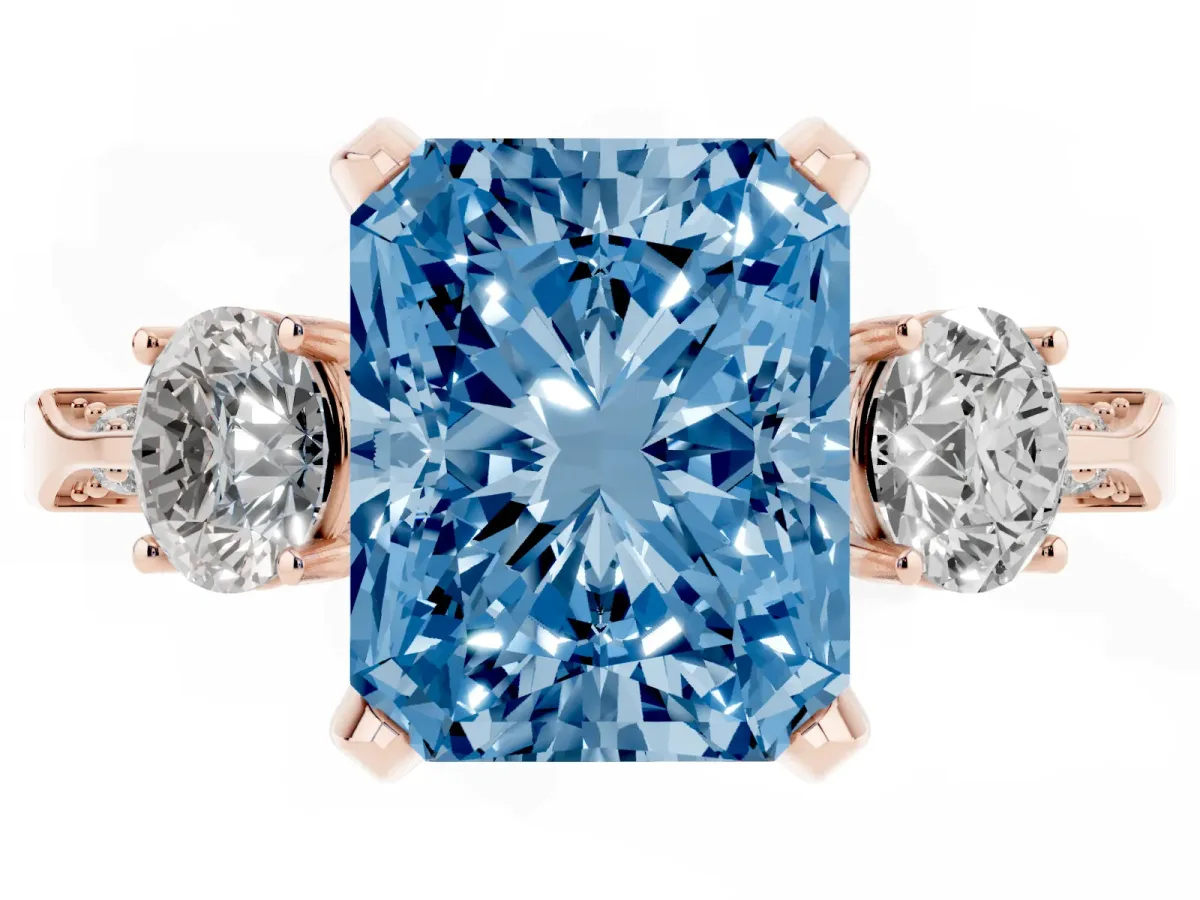 Fancy Blue Radiant Cut Brilliant Three-Stone Diamond Ring with Pavé Band and Four-Prong Setting Rose gold