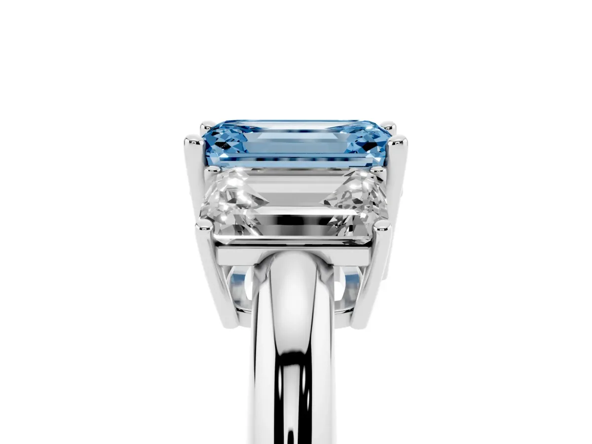 Fancy Blue Three-Stone Emerald Cut Cut Diamond Engagement Ring with Prong Setting on a White Gold Band White gold