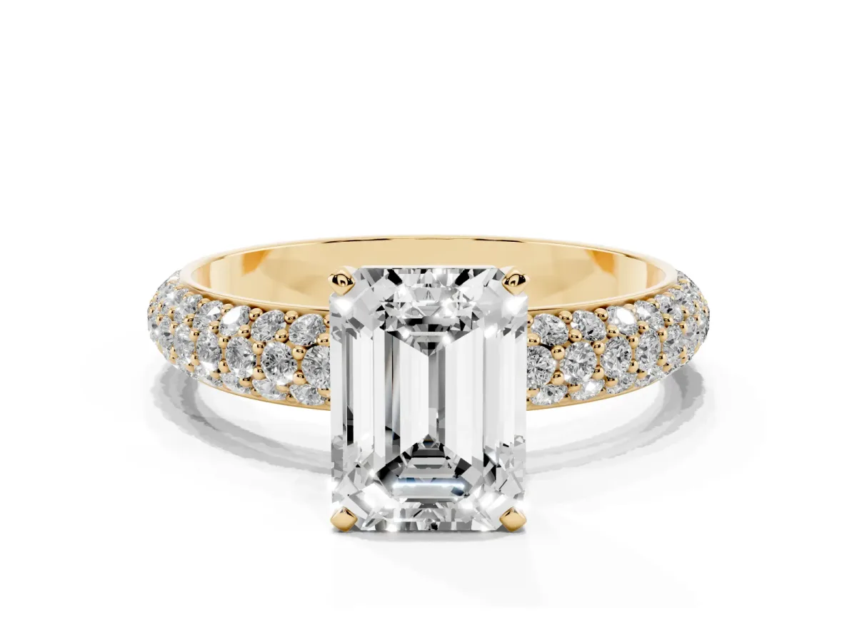 Emerald Cut Diamond Solitaire Ring with Prong Setting and Pavé Band Yellow gold