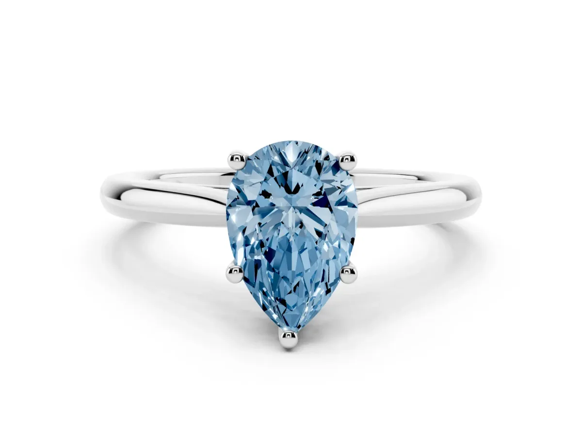 Fancy Blue Pear Cut Cut Solitaire Ring with Cathedral Band and Four-Prong Setting Silver
