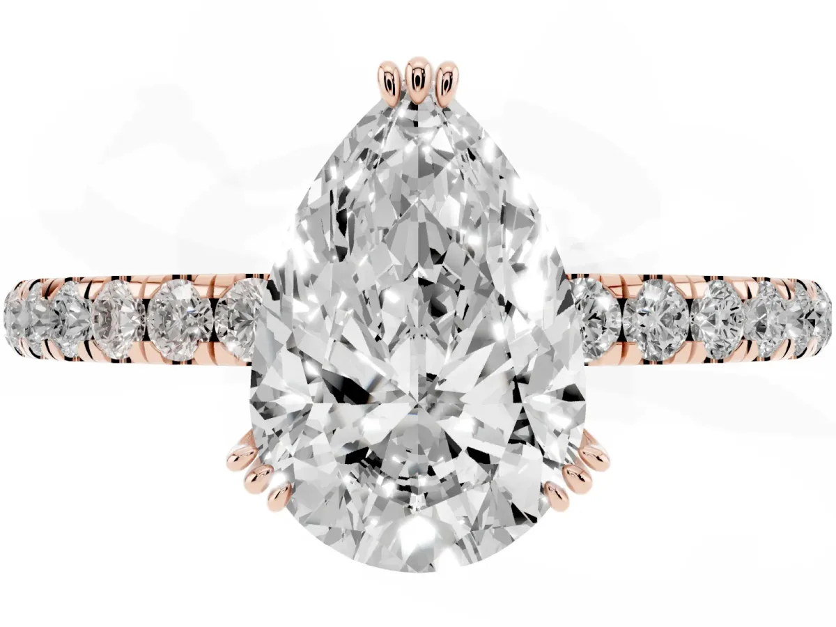 Pear Cut Brilliant Solitaire with Pavé Band and Claw Prong Setting Rose gold