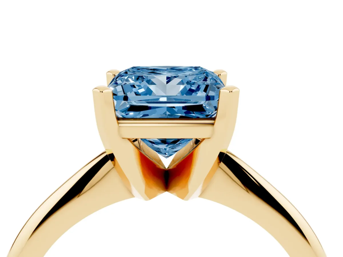 Fancy Blue Princess Cut Cut Solitaire Ring with Four-Prong Setting on a Classic Band Yellow gold