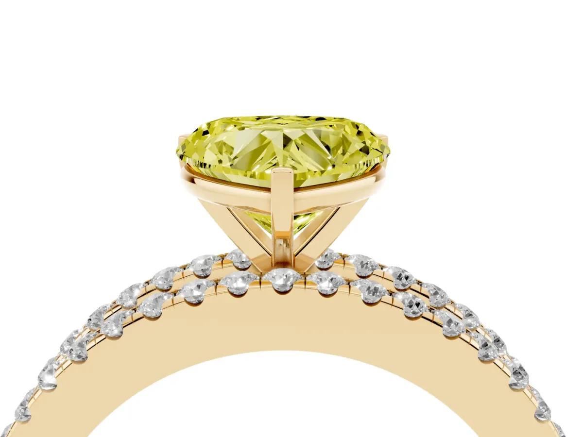 Fancy Yellow Heart Cut Diamond Solitaire Ring with Pavé and Channel Set Band Yellow gold