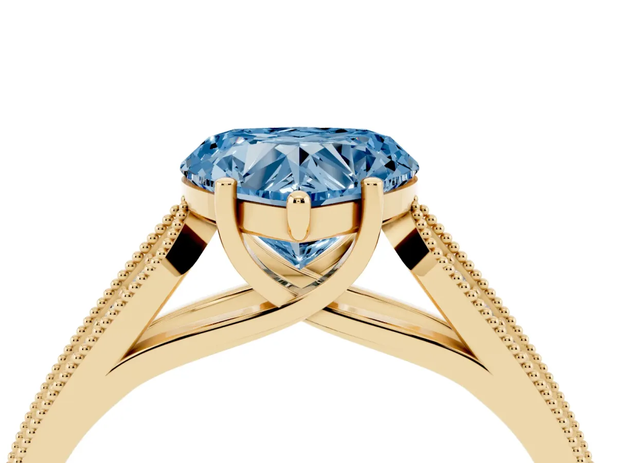 Fancy Blue Heart Cut Cut Pave Split Shank Engagement Ring with Four-Prong Setting Yellow gold