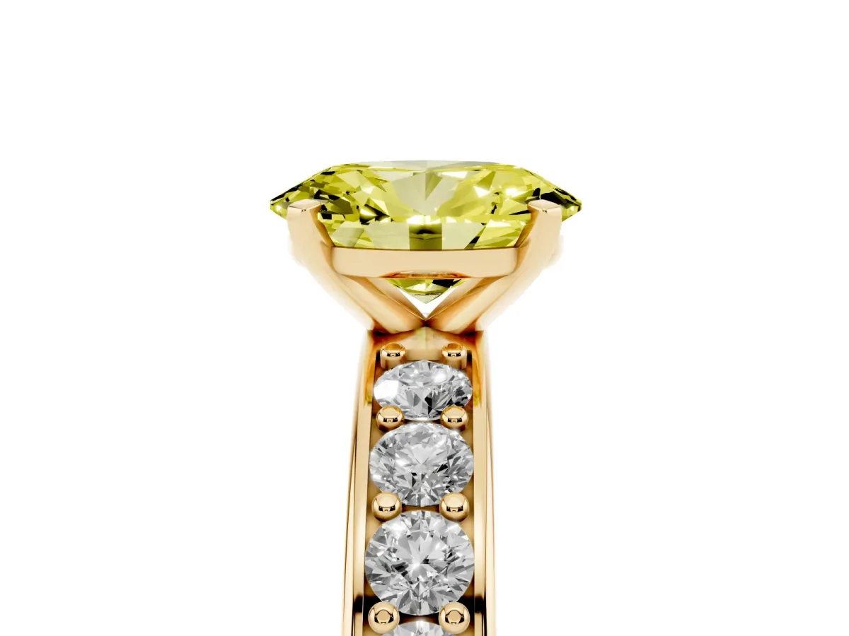 Fancy Yellow Oval Cut Diamond Engagement Ring with Channel Set Round Band and Prong Setting Yellow gold