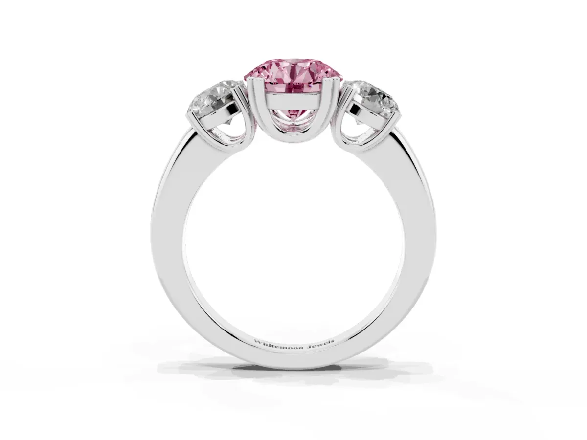 Fancy Pink Three-Stone Round Cut Cut Diamond Ring with Channel Set Band and Four-Prong Setting White gold