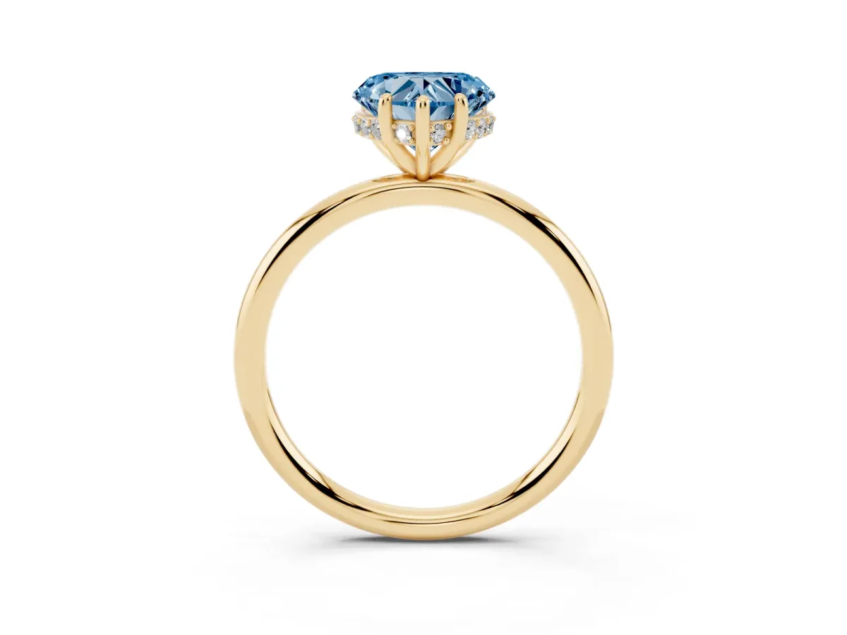 Fancy Blue Heart Cut Solitaire Diamond Ring with a Classic Band and Four-Prong Setting Yellow gold