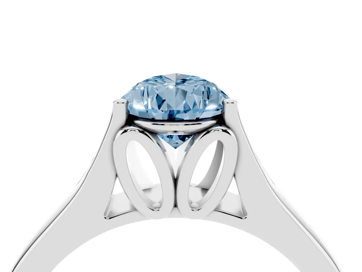 Fancy Blue Pear Cut Solitaire Diamond Ring with Cathedral Band and Four-Prong Setting Platinum