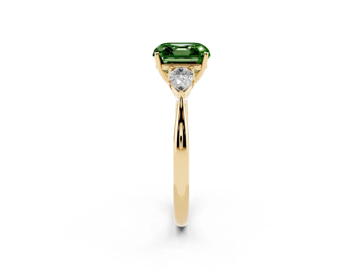 Fancy Green Three-Stone Asscher Cut Diamond Ring with Pear Side Stones in Four-Prong Setting Yellow gold