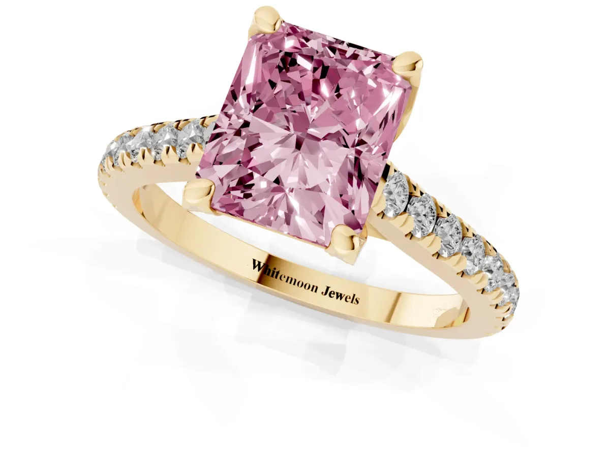 Fancy Pink Radiant Cut Brilliant Diamond Solitaire with Pavé Band and Four-Prong Setting Yellow gold