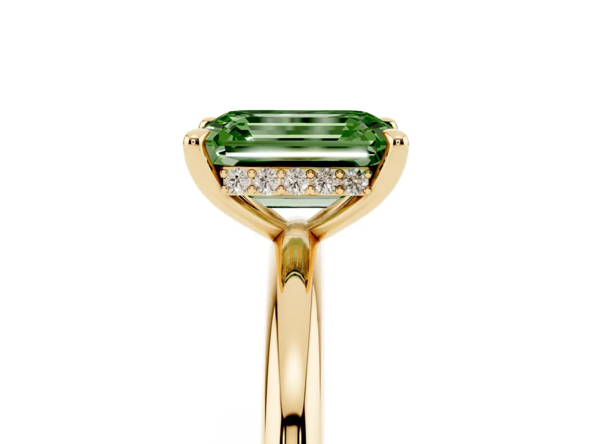 Fancy Green Emerald Cut Diamond Solitaire Ring with Thin Band and Four-Prong Setting Yellow gold