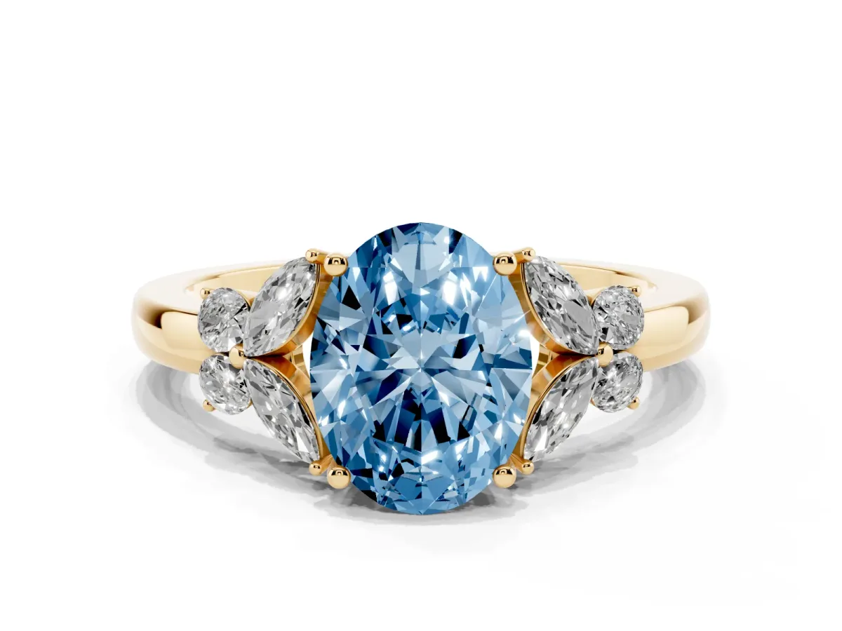 Fancy Blue Oval Cut Cut Solitaire Floral Diamond Ring with Four-Prong Setting Yellow gold