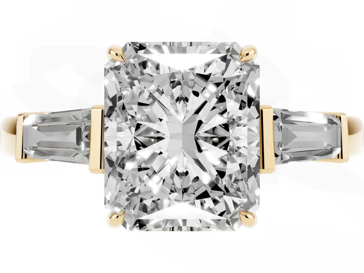 Radiant Cut Diamond Three-Stone Ring with Tapered Baguette Side Stones and Prong Setting Yellow gold