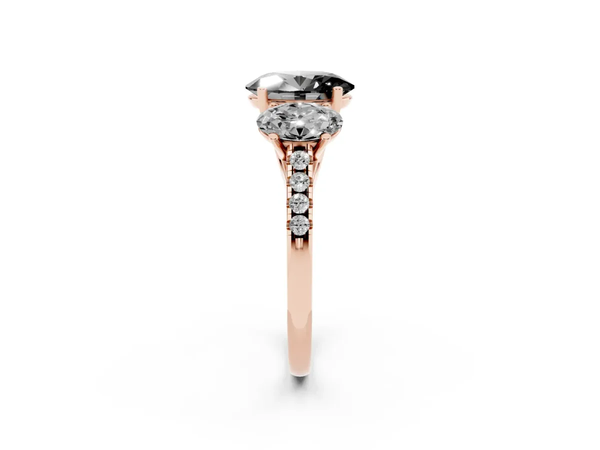 Fancy Black Three-Stone Oval Cut Diamond Ring with Round Pavé Band and Prong Setting Rose gold