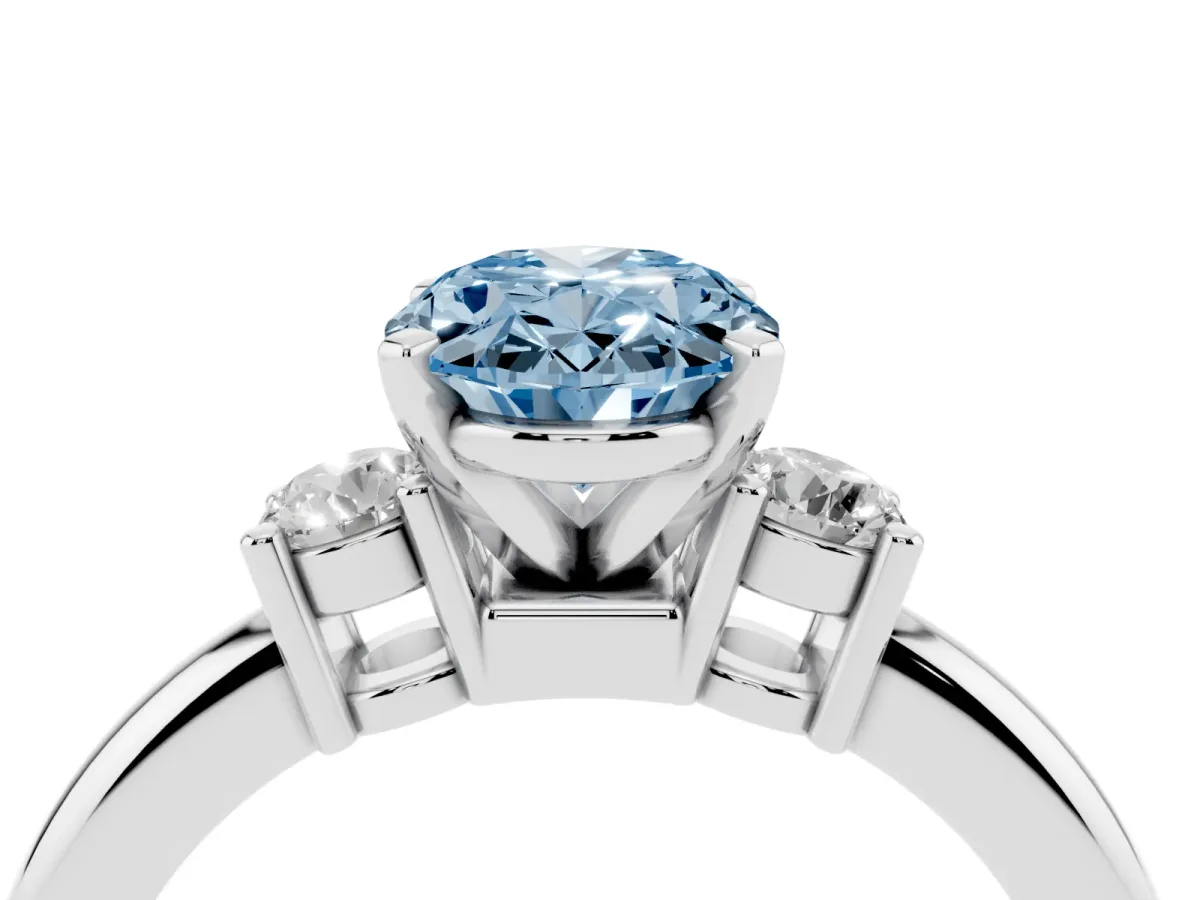 Fancy Blue Three-Stone Oval Cut Cut Diamond Solitaire with Prong Setting and Classic Band Platinum