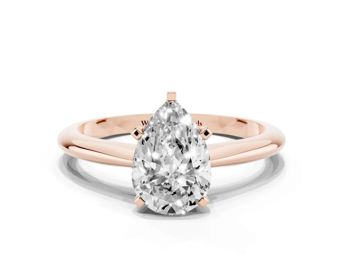 Pear Cut Cut Solitaire Ring with Four-Prong Setting on a Classic Band Rose gold