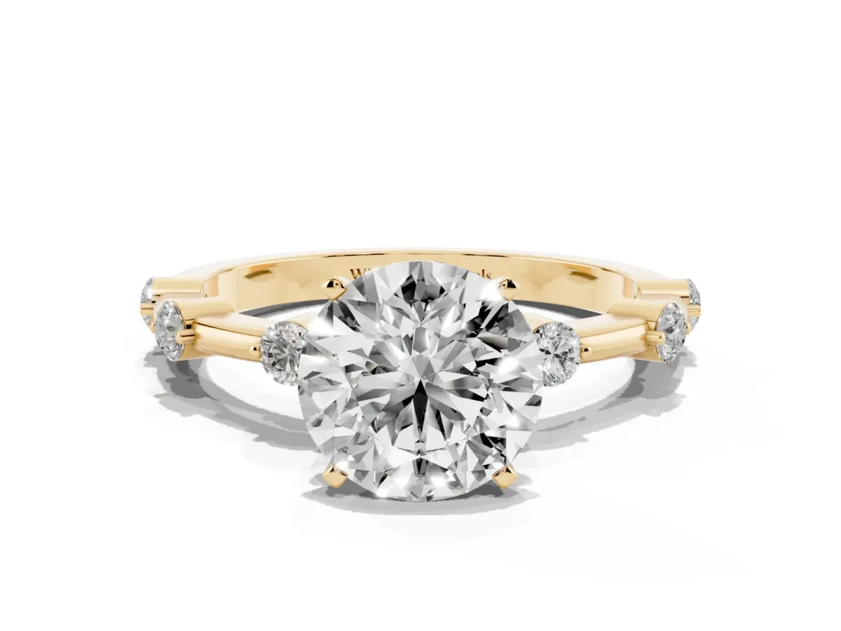 Round Cut Solitaire Diamond Ring with Bezel Set Side Stones and Prong Setting Yellow gold