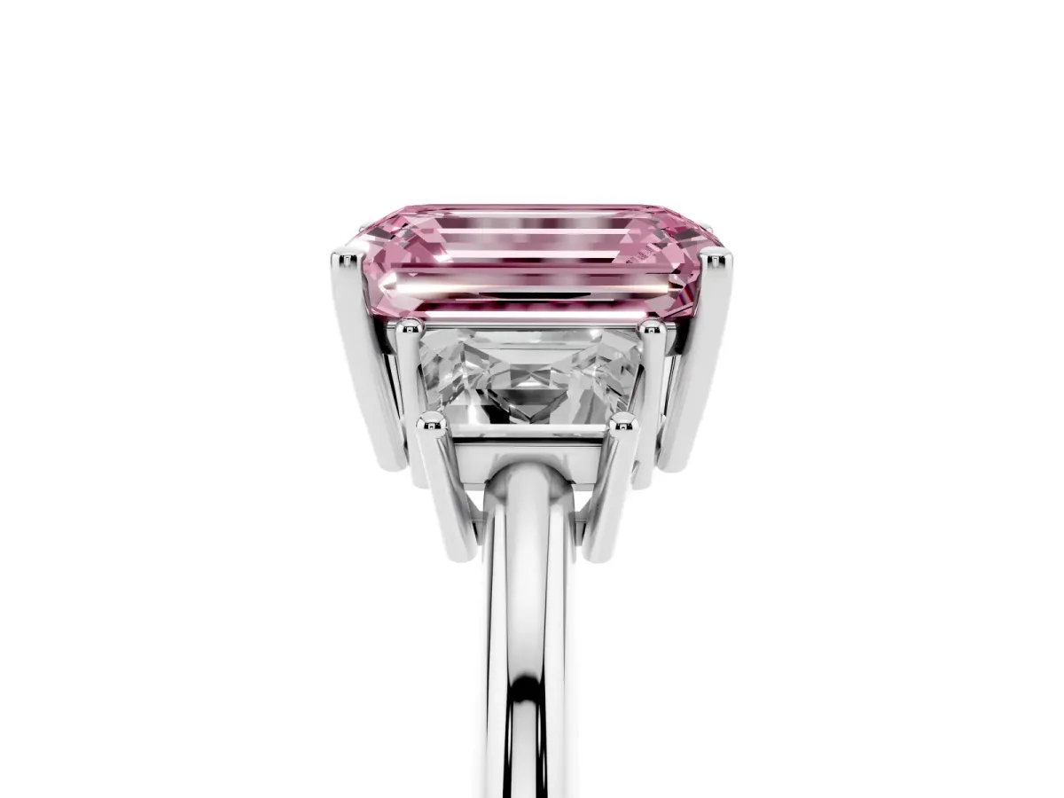 Fancy Pink Emerald Cut Diamond Three-Stone Ring with Trapezoid Side Stones and Prong Setting Platinum