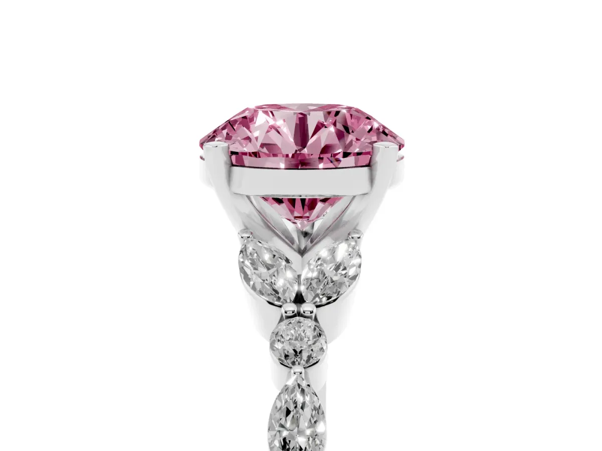 Fancy Pink Round Cut Diamond Solitaire Ring with Side Stones and Four-Prong Setting Platinum