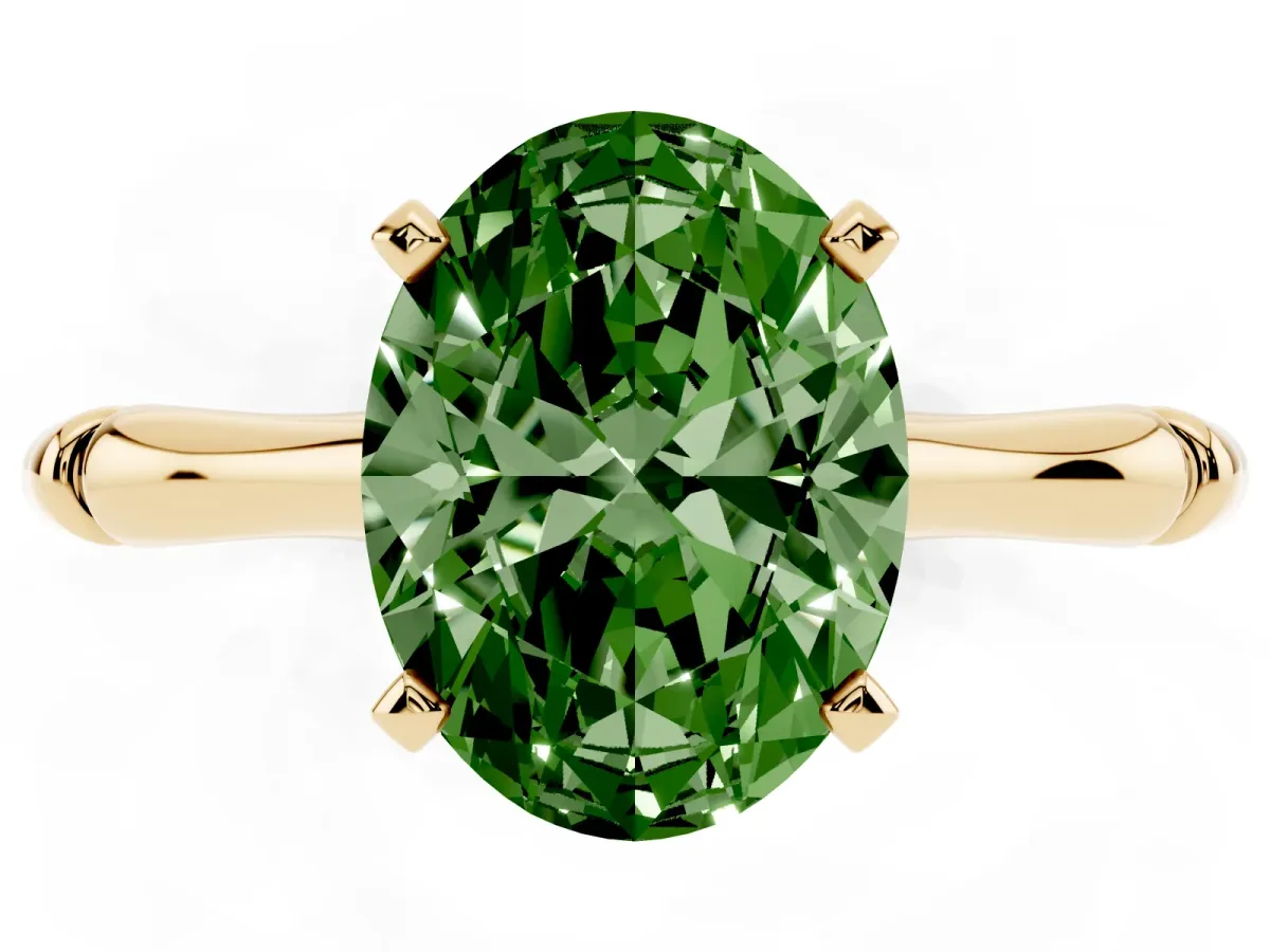 Fancy Green Oval Cut Solitaire Diamond Ring with Bamboo Band and Four-Prong Setting Yellow gold