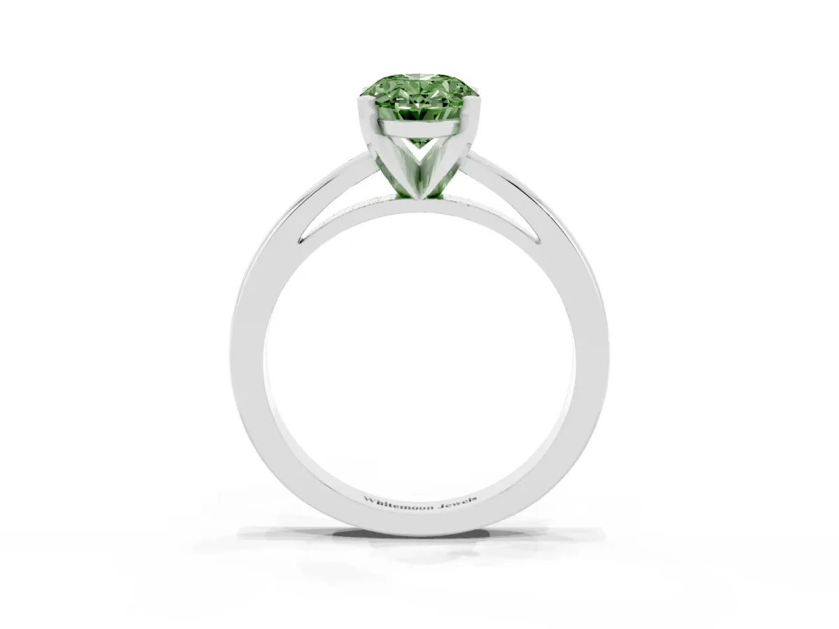 Fancy Green Oval Cut Solitaire Diamond Engagement Ring with Four-Prong Setting on a Classic Band Silver