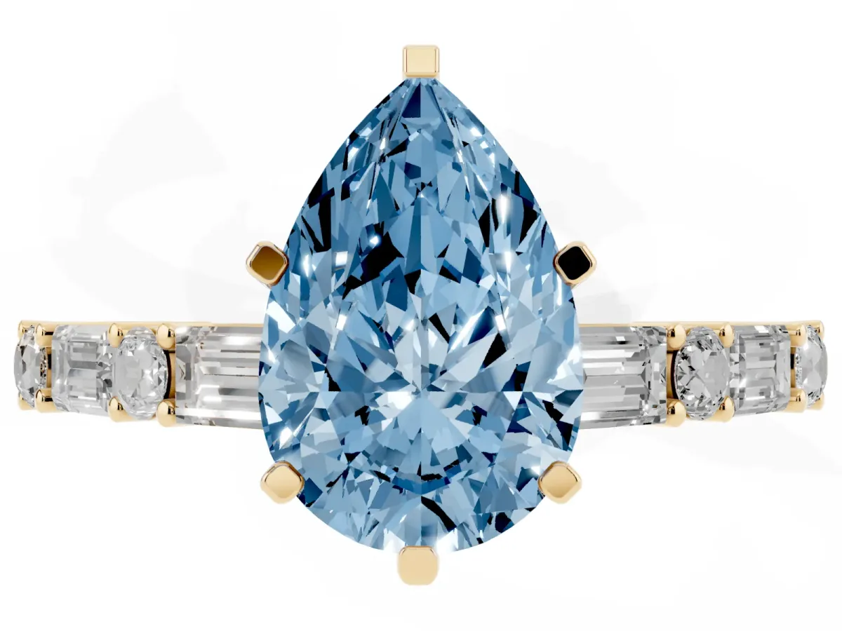 Fancy Blue Pear Cut Diamond Solitaire with Side Baguettes and Channel Set Band Yellow gold