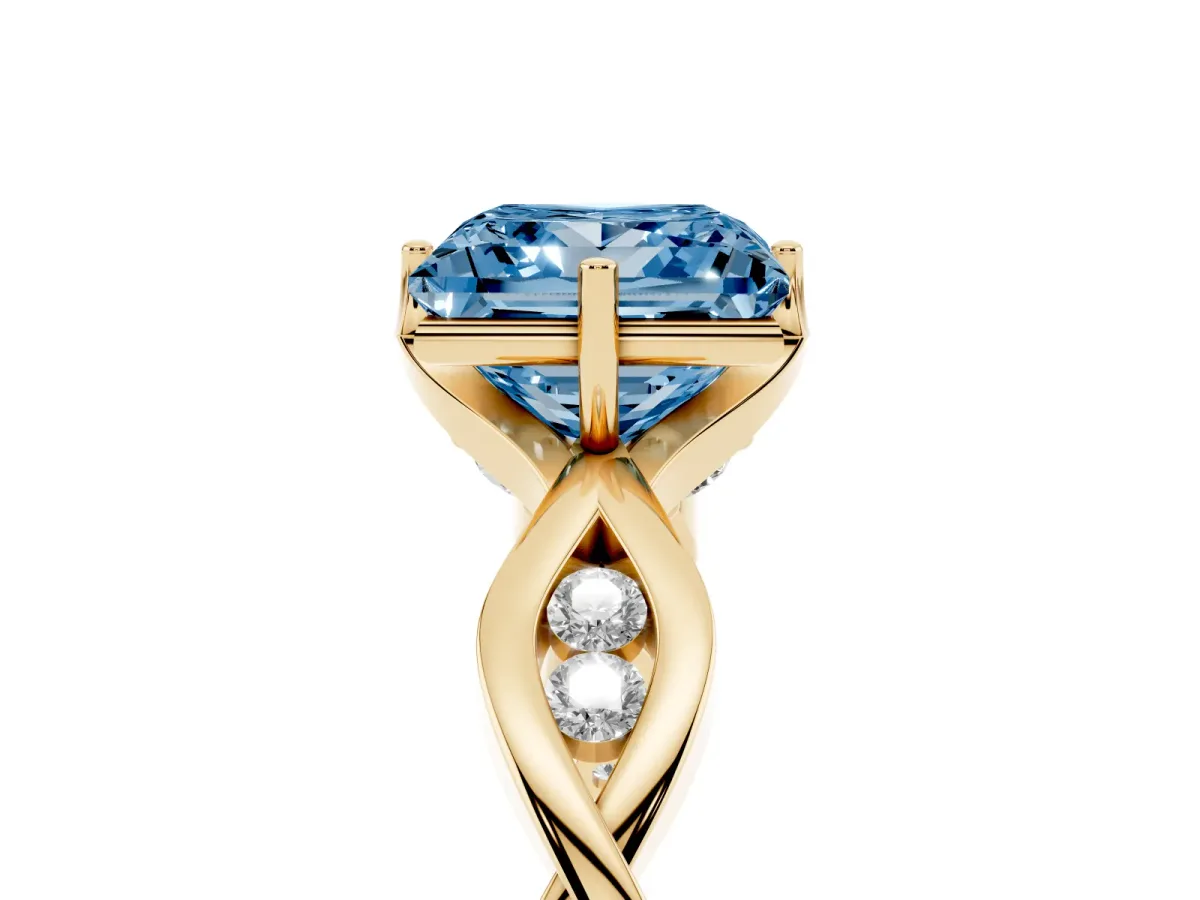 Fancy Blue Princess Cut Solitaire Twist Band with Leaf Prong Setting Yellow gold