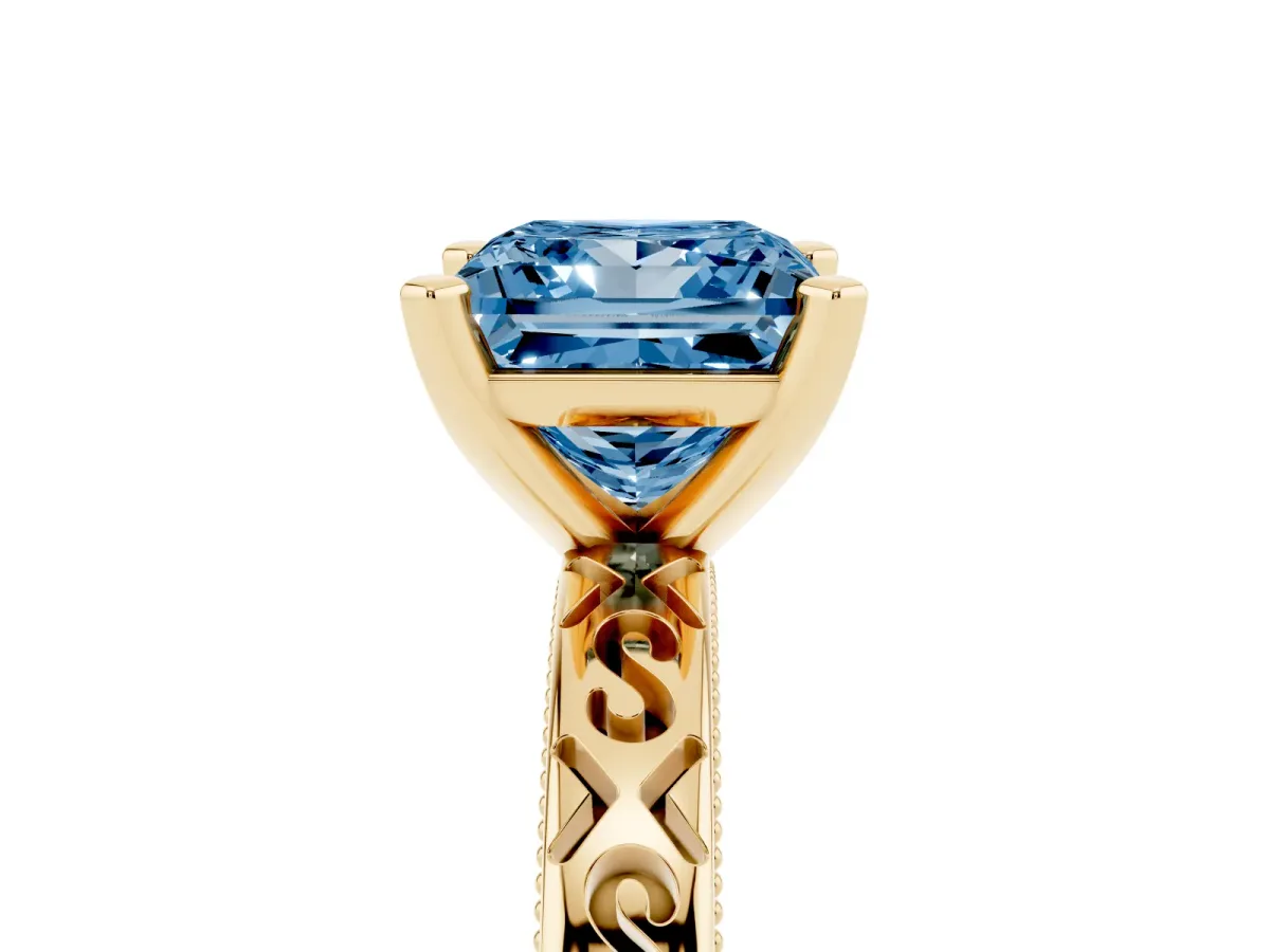 Fancy Blue Princess Cut Solitaire Engagement Ring with Scrollwork Band and Four-Prong Setting Yellow gold