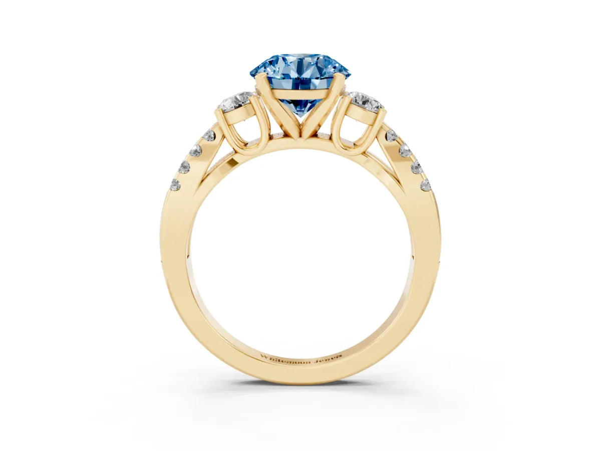 Fancy Blue Round Cut Diamond Three-Stone Ring with Pavé Split Shank and Four-Prong Setting Yellow gold