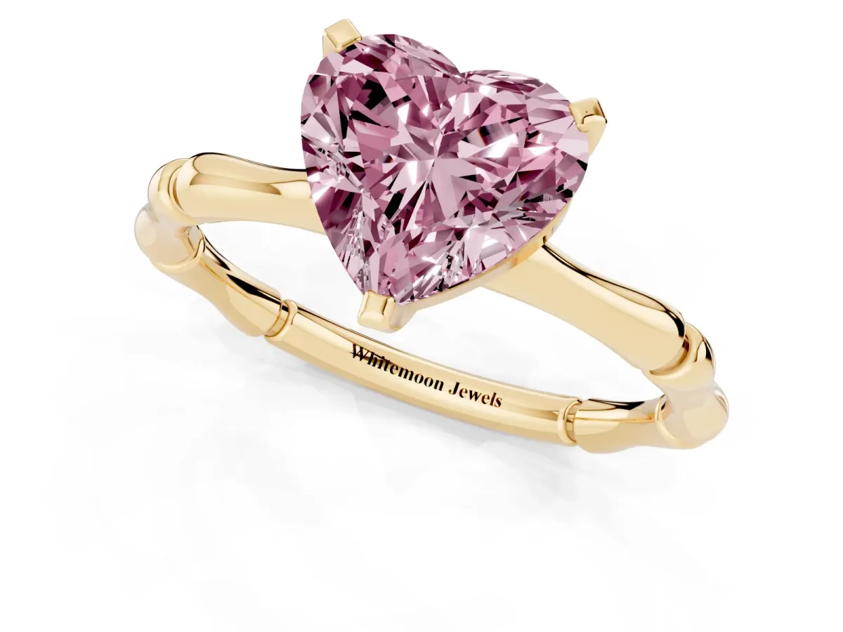 Fancy Pink Heart Cut Solitaire Diamond Ring with Bamboo Band and Four-Prong Setting Yellow gold