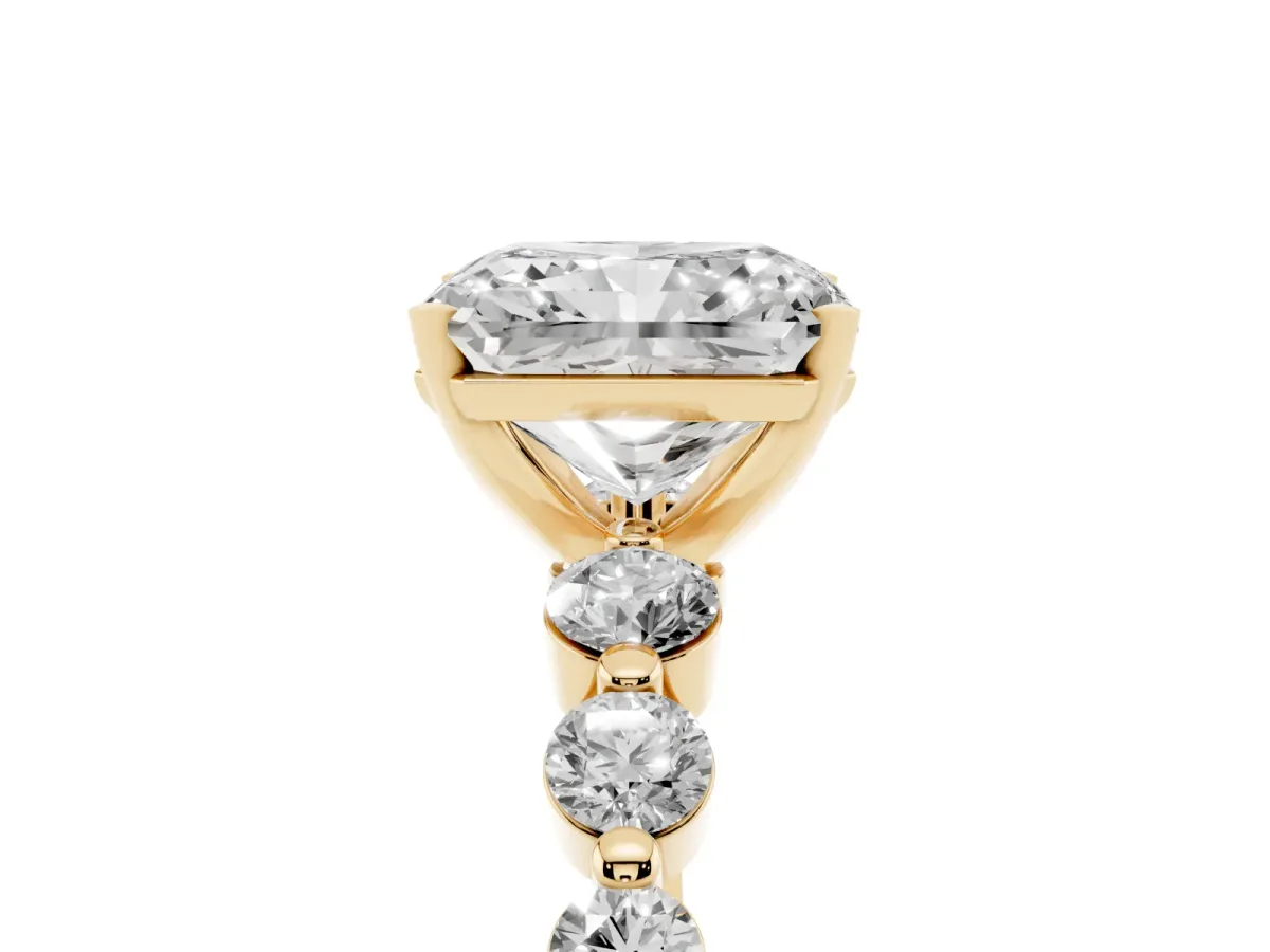 Radiant Cut Solitaire Diamond Ring with Pave Band and Four-Prong Setting Yellow gold
