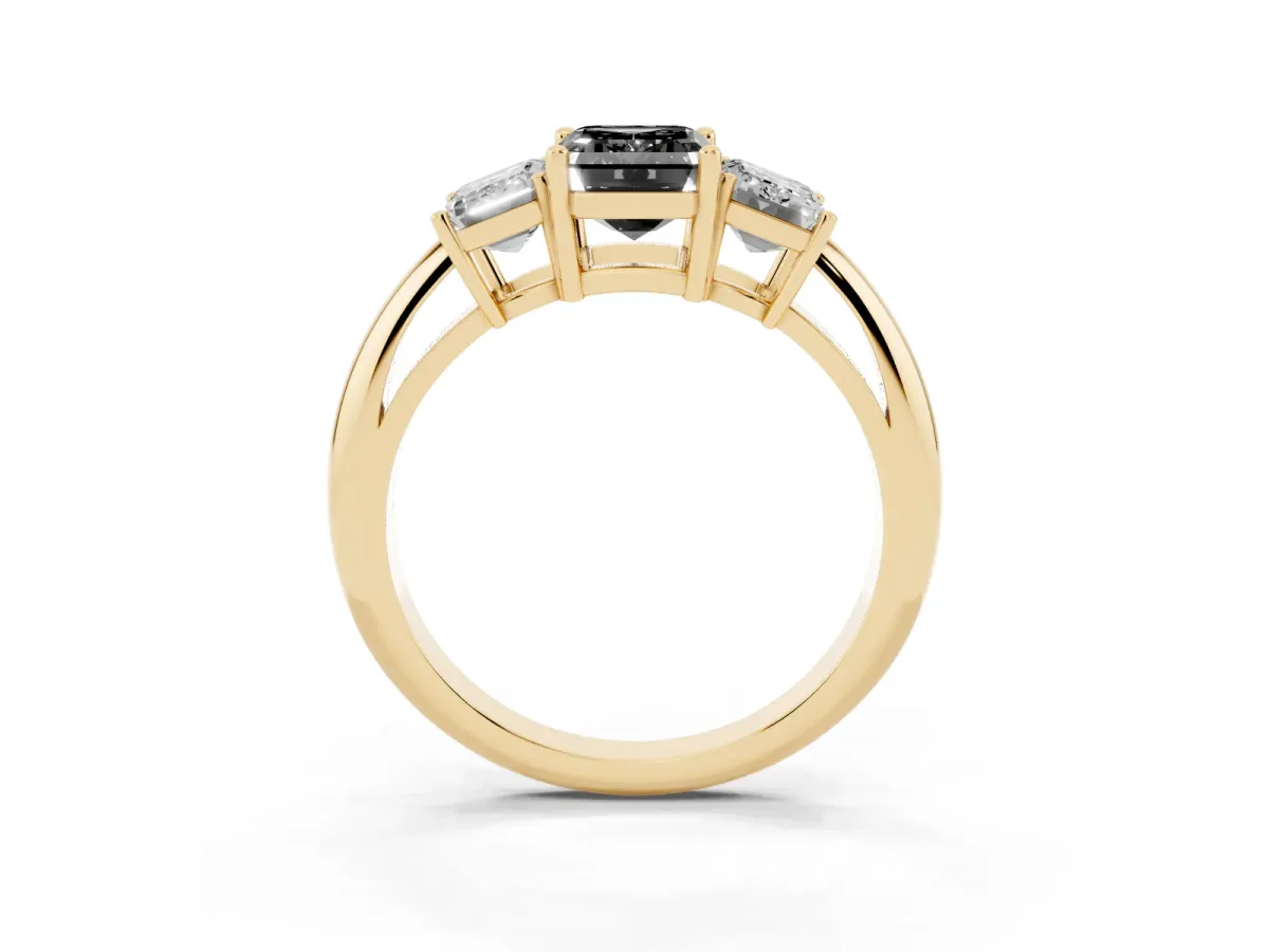 Fancy Black Three-Stone Emerald Cut Cut Diamond Engagement Ring with Prong Setting on a White Gold Band Yellow gold