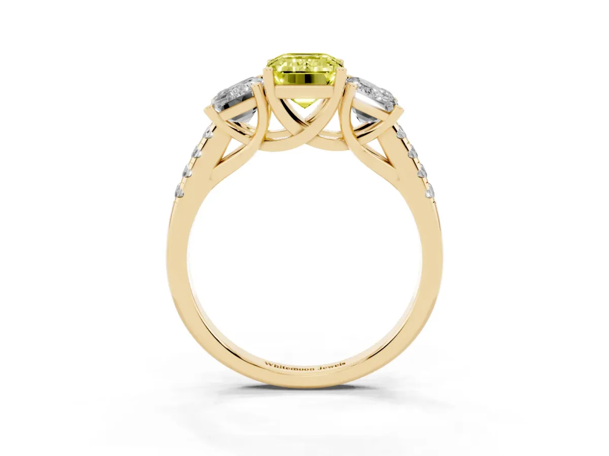 Fancy Yellow Three-Stone Emerald Cut Diamond Ring with Round Pavé Band and Prong Setting Yellow gold