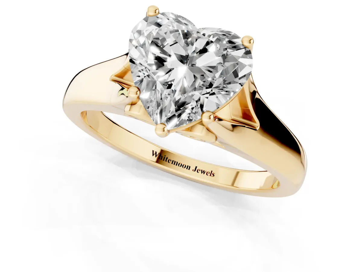 Heart Cut Solitaire Diamond Ring with Cathedral Band and Four-Prong Setting Yellow gold